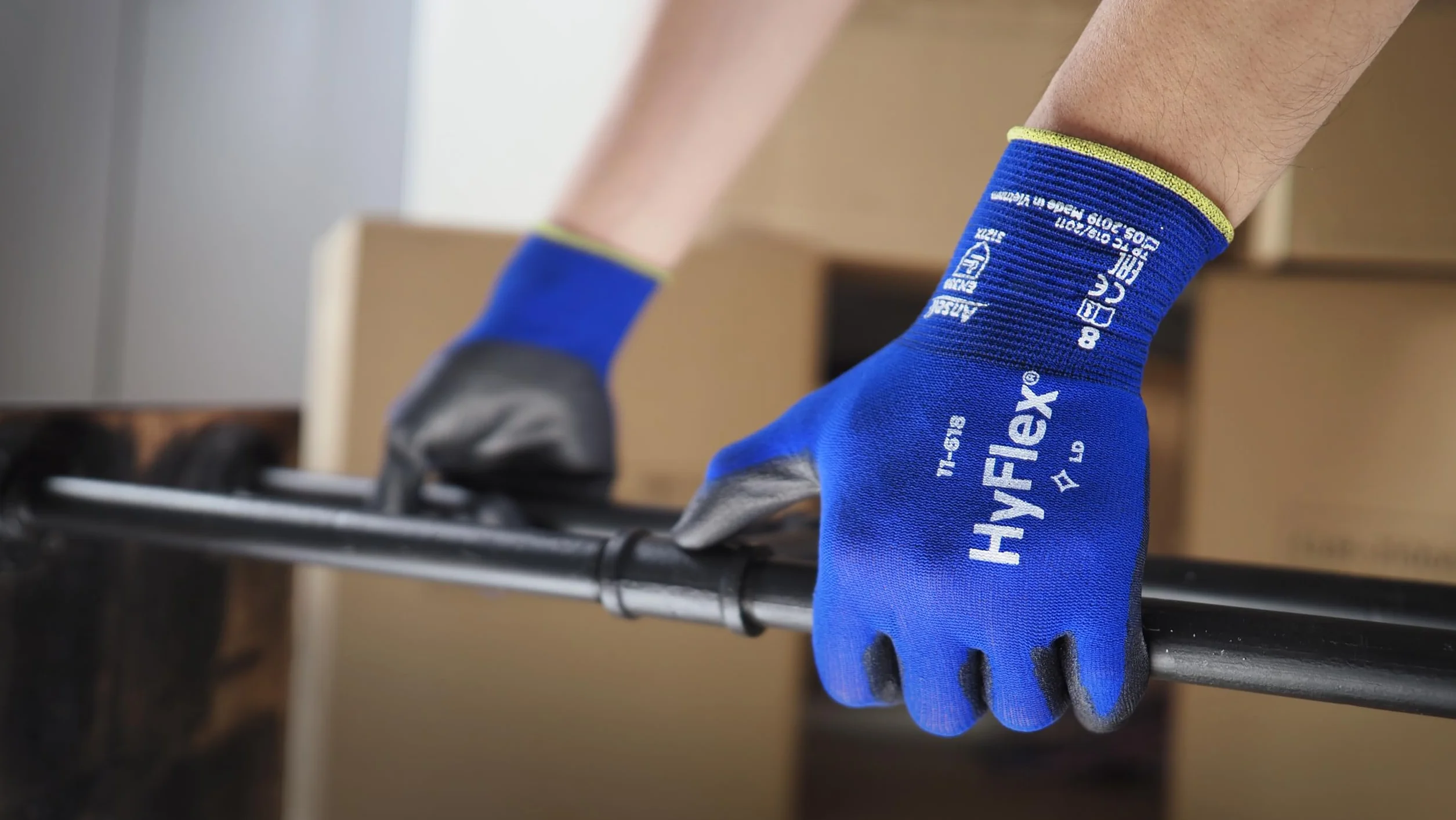 Ansell HyFlex 11-618, Cienkie rękawice robocze z nylonu, Rękawice mechaniczne, Wielofunkcyjne, Odzież robocza trwała, Niebieskie, Czarne, rozmiar L (12 pary)