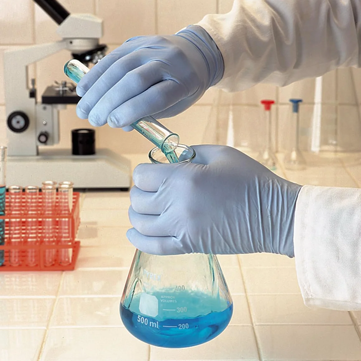 Ansell TouchNTuff 92-665,Wielofunkcujne rękawiczki jednorazowe z nitrylem,Bezpudrowe,Bez lateksu,Do przygotowywania żywności,Odporne na chemikalia,Ochrona mechaniczna,Niebieskie,M (100 rękawiczek)